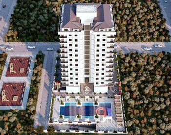 Недвижимость в проекте в 300 м от моря в Алании 1