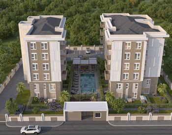 Antalya Kepez'de Havuzlu Projede Ara Kat ve Bahçe Katı Daireler 1