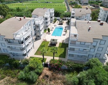 Appartement En Rez-de-chaussée Avec Piscine Commune À Antalya 1