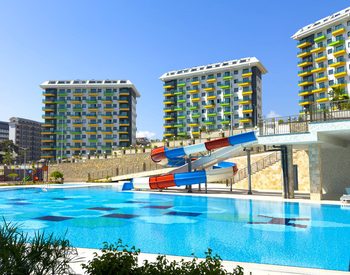 Alanya'da 5 Bloklu Projede Deniz ve Şehir Manzaralı Daireler 1